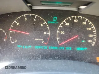 2002 Cadillac DeVille DTS with VIN 1G6KF57942U231877, listed as a Copart auction lot 76724554 with 180,082 mi miles and Salvage Title. Bid and sale history available at carsss.com. Image 9.