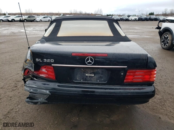 1997 Mercedes-Benz SL-Class with VIN WDBFA63F5VF145337, listed as a Copart auction lot 79991204 with 134,424 mi miles and Salvage Title. Bid and sale history available at carsss.com. Image 6.