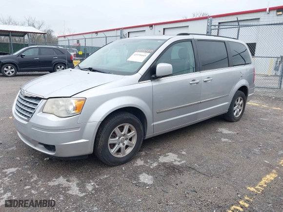 2010 Chrysler Town & Country Touring with VIN 2A4RR5D12AR265985, listed as a IAAI auction lot 41970445 with 125,635 mi miles. Bid and sale history available at carsss.com. Image 17.