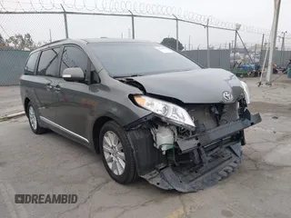 2013 Toyota Sienna XLE with VIN 5TDDK3DC6DS059963, listed as a IAAI auction lot 42703023 with 212,980 mi miles and . Bid and sale history available at DreamBid. Image 1.