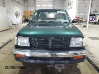 1999 Toyota Tacoma with VIN 4TANL42N4XZ453505, listed as a Copart auction lot 63399325 with 175,198 mi miles and Salvage title. Bid and sale history available at DreamBid. Image 5.