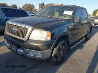 2005 Ford F-150 XLT with VIN 1FTPW12575KC65392, listed as a IAAI auction lot 41945648 with 265,153 mi miles. Bid and sale history available at carsss.com. Image 2.
