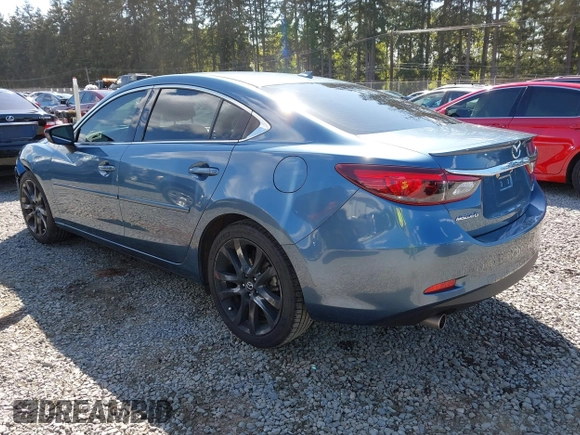 2016 Mazda Mazda6 i Grand Touring with VIN JM1GJ1W51G1436977, listed as a IAAI auction lot 42097363 with 128,941 mi miles. Bid and sale history available at carsss.com. Image 3.