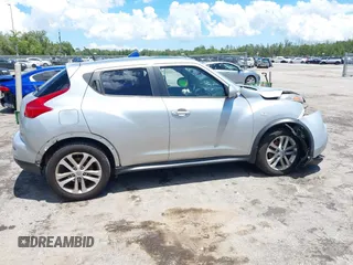2014 Nissan Juke SV z VIN JN8AF5MV9ET359296, wystawiony jako IAAI lot #42250580 z przebiegiem 97 249 mil mil oraz . Historia ofert i sprzedaży dostępna na DreamBid. Obrazek 6.