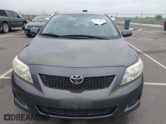 2009 Toyota Corolla z VIN JTDBL40E99J047697, wystawiony jako IAAI lot #42274336 z przebiegiem 184 756 mil mil oraz . Historia ofert i sprzedaży dostępna na DreamBid. Obrazek 6.