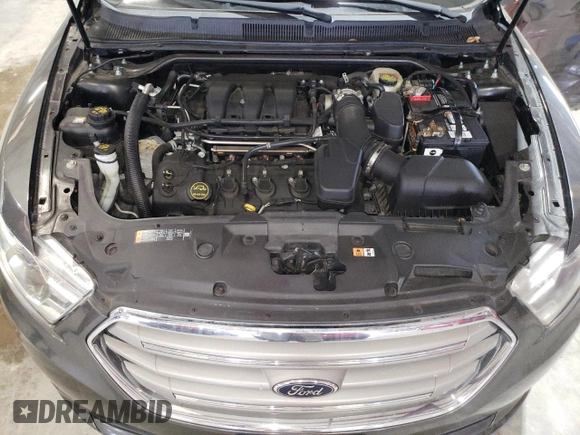 2017 Ford Taurus SEL with VIN 1FAHP2E82HG124014, listed as a Copart auction lot 47630015 with 136,099 mi miles and Salvage Title. Bid and sale history available at DreamBid. Image 11.