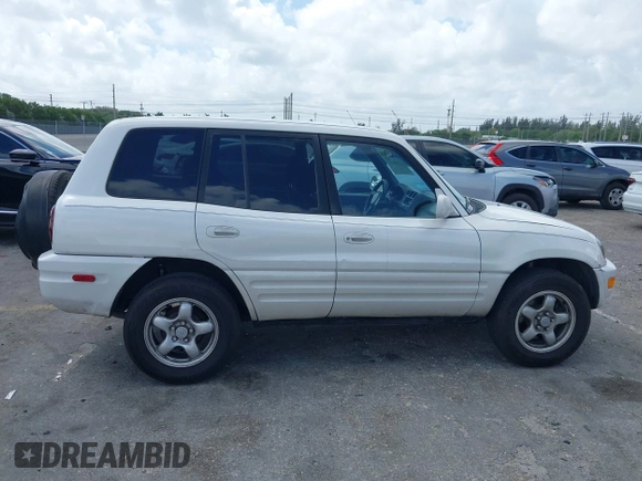 1999 Toyota RAV4 with VIN JT3GP10V5X7043735, listed as a IAAI auction lot 41939137 with 206,044 mi miles and . Bid and sale history available at DreamBid. Image 13.