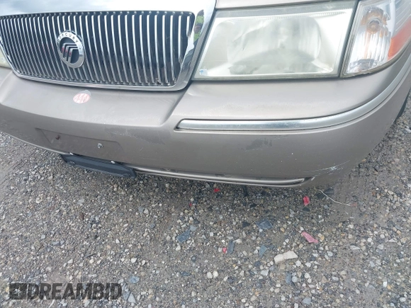 2005 Mercury Grand Marquis LS Premium z VIN 2MEFM75W25X661590, wystawiony jako IAAI lot #42534626 z przebiegiem 113 450 mil mil oraz . Historia ofert i sprzedaży dostępna na DreamBid. Obrazek 16.