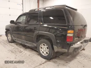 2004 Chevrolet Tahoe LS with VIN 1GNEK13T24R242907, listed as a IAAI auction lot 41496795 with 261,402 mi miles. Bid and sale history available at carsss.com. Image 3.
