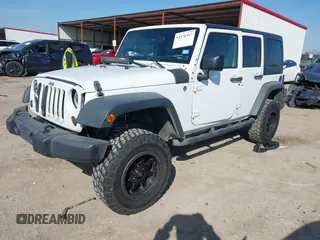 2014 Jeep Wrangler Unlimited Sport with VIN 1C4BJWDG2EL100591, listed as a IAAI auction lot 41578357 with 155,929 mi miles and . Bid and sale history available at DreamBid. Image 17.