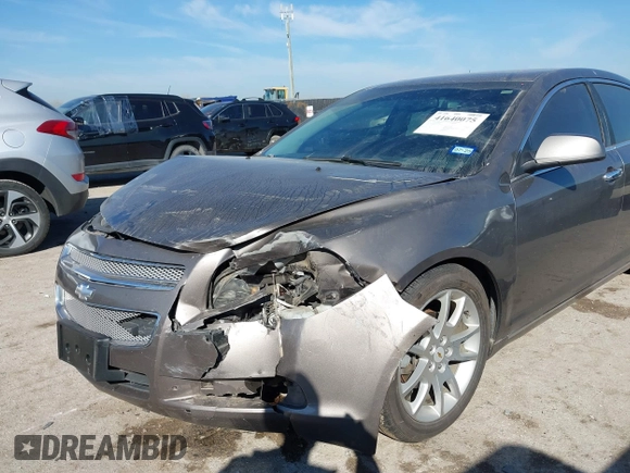 2012 Chevrolet Malibu LTZ with VIN 1G1ZG5E74CF133103, listed as a IAAI auction lot 41640075 with 173,692 mi miles and . Bid and sale history available at DreamBid. Image 6.