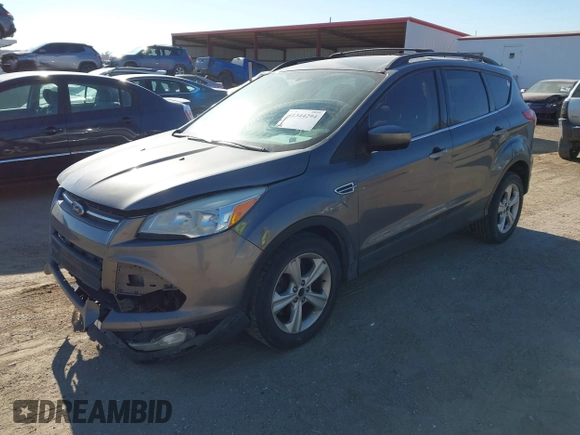 2014 Ford Escape SE with VIN 1FMCU0GX6EUA77052, listed as a IAAI auction lot 41344294 with 223,184 mi miles. Bid and sale history available at carsss.com. Image 2.