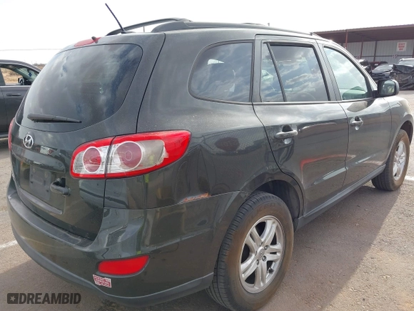 2012 Hyundai Santa Fe GLS with VIN 5XYZG3AB2CG128873, listed as a IAAI auction lot 41874808 with 182,453 mi miles. Bid and sale history available at carsss.com. Image 4.