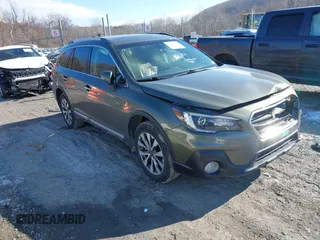 2019 Subaru Outback Touring with VIN 4S4BSATC7K3272301, listed as a IAAI auction lot 41318172 with 102,417 mi miles and . Bid and sale history available at DreamBid. Image 1.