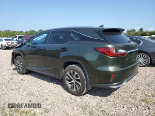 2021 Lexus RX with VIN JTJHZKFA8M2033856, listed as a Copart auction lot 70485624 with 51,562 mi miles and Salvage Title. Bid and sale history available at carsss.com. Image 2.