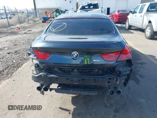2017 BMW M6 z VIN WBS6E9C58HG437411, wystawiony jako IAAI lot #41636164 z przebiegiem 52 724 mil mil oraz . Historia ofert i sprzedaży dostępna na DreamBid. Obrazek 16.