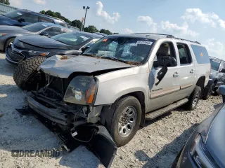 2007 GMC Yukon XL SLT z VIN 1GKFK16357J183674, wystawiony jako Copart lot #61713465 z przebiegiem Nie podano mil oraz Szkoda całkowita • Salvage title. Historia ofert i sprzedaży dostępna na DreamBid. Obrazek 1.