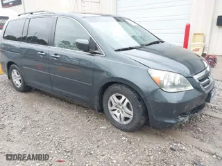 2005 Honda Odyssey EX-L with VIN 5FNRL38745B047221, listed as a IAAI auction lot 41732407 with 275,604 mi miles. Bid and sale history available at carsss.com. Image 6.