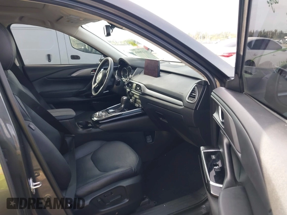 2020 Mazda CX-9 Touring z VIN JM3TCACY5L0412308, wystawiony jako IAAI lot #41208401 z przebiegiem 37 029 mil mil oraz . Historia ofert i sprzedaży dostępna na DreamBid. Obrazek 5.