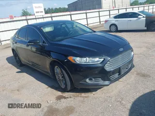 2014 Ford Fusion SE with VIN 3FA6P0HD4ER390773, listed as a IAAI auction lot 42088373 with 265,001 mi miles and . Bid and sale history available at DreamBid. Image 1.