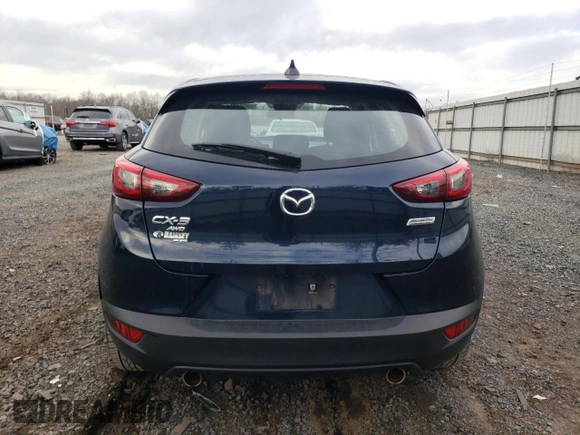 2018 Mazda CX-3 Sport with VIN JM1DKFB78J0315770, listed as a Copart auction lot 50004525 with 94,301 mi miles and Salvage Title. Bid and sale history available at DreamBid. Image 6.