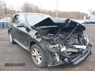 2014 BMW X5 xDrive35i z VIN 5UXKR0C51E0H26528, wystawiony jako IAAI lot #42027626 z przebiegiem 87 228 mil mil oraz . Historia ofert i sprzedaży dostępna na DreamBid. Obrazek 6.