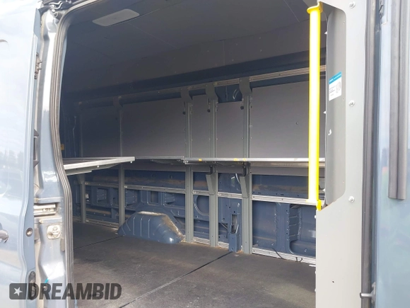 2020 Ford Transit Cargo with VIN 1FTBR3X85LKA28378, listed as a IAAI auction lot 42208608 with 82,322 mi miles and . Bid and sale history available at DreamBid. Image 6.