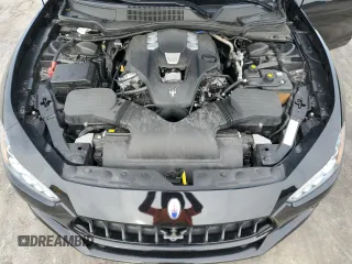 2019 Maserati Ghibli с VIN ZAM57XSA3K1311169, выставлен на аукционе Copart как лот 49583325 с пробегом 66 290 миль миль и Списание • Salvage title. История ставок и продаж доступна на DreamBid. Изображение 11.