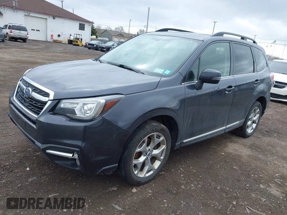 2017 Subaru Forester Touring with VIN JF2SJATC5HH518783, listed as a IAAI auction lot 41889172 with 115,801 mi miles and . Bid and sale history available at DreamBid. Image 16.