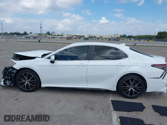 2022 Toyota Camry SE with VIN 4T1G11AK9NU659417, listed as a IAAI auction lot 41733094 with 74,054 mi miles. Bid and sale history available at carsss.com. Image 14.