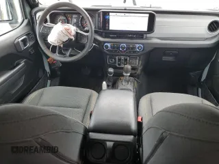 2024 Jeep Wrangler Sport S with VIN 1C4PJXDG6RW229336, listed as a Copart auction lot 51260335 with 5,198 mi miles and Salvage Title. Bid and sale history available at DreamBid. Image 8.