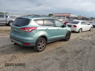 2013 Ford Escape SEL with VIN 1FMCU0HX1DUD56986, listed as a IAAI auction lot 42026927 with 180,318 mi miles. Bid and sale history available at carsss.com. Image 4.