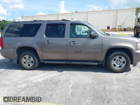 2012 Chevrolet Suburban LT with VIN 1GNSKJE72CR130111, listed as a IAAI auction lot 42699365 with 216,827 mi miles and . Bid and sale history available at DreamBid. Image 13.