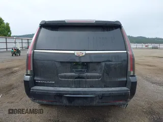 2017 Cadillac Escalade Premium Luxury z VIN 1GYS4CKJ0HR271498, wystawiony jako IAAI lot #42349511 z przebiegiem 52 338 mil mil oraz . Historia ofert i sprzedaży dostępna na DreamBid. Obrazek 16.