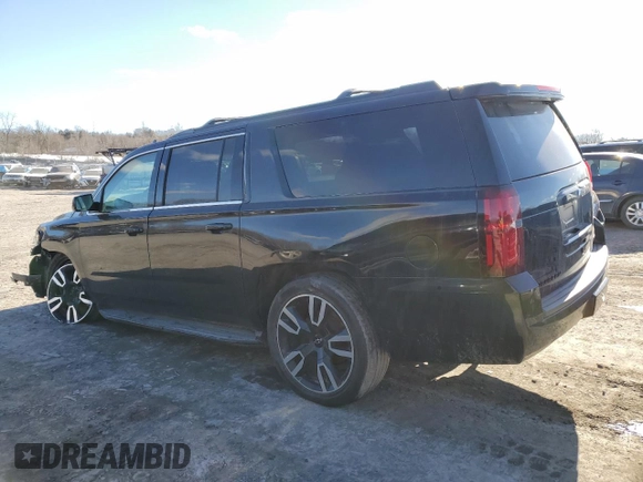 2019 Chevrolet Suburban Premier with VIN 1GNSKJKC7KR146871, listed as a Copart auction lot 43017234 with 96,965 mi miles and Salvage Title. Bid and sale history available at DreamBid. Image 2.