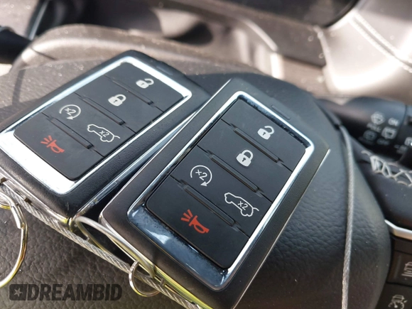 2023 Jeep Grand Cherokee Limited with VIN 1C4RJGBG2PC502847, listed as a IAAI auction lot 42471744 with 33,310 mi miles and . Bid and sale history available at DreamBid. Image 11.
