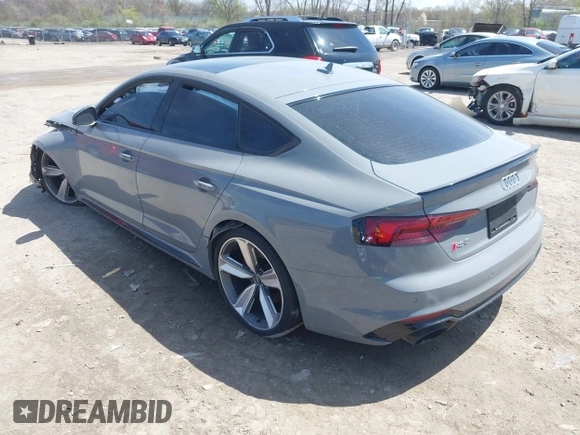 2019 Audi RS 5 Sportback z VIN WUABWCF53KA907286, wystawiony jako IAAI lot #42098943 z przebiegiem 62 275 mil mil oraz . Historia ofert i sprzedaży dostępna na DreamBid. Obrazek 3.