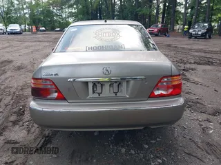 2002 Acura RL with VIN JH4KA96682C009762, listed as a IAAI auction lot 42450219 with 207,765 mi miles and . Bid and sale history available at DreamBid. Image 16.