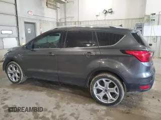 2019 Ford Escape Titanium with VIN 1FMCU0J91KUC02268, listed as a Copart auction lot 54150445 with 165,897 mi miles and Salvage title. Bid and sale history available at DreamBid. Image 2.