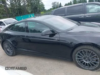 2021 Tesla Model S Plaid with VIN 5YJSA1E62MF447509, listed as a IAAI auction lot 42509281 with 32,372 mi miles and . Bid and sale history available at DreamBid. Image 14.
