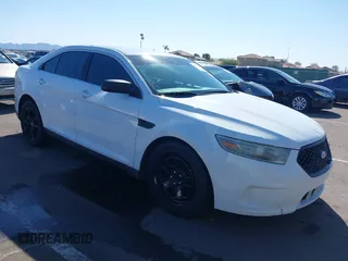 2013 Ford Sedan Police Interceptor with VIN 1FAHP2M82DG132383, listed as a IAAI auction lot 41851540 with 172,639 mi miles. Bid and sale history available at carsss.com. Image 1.
