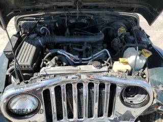 2002 Jeep Wrangler Sport с VIN 1J4FA49SX2P738105, выставлен на аукционе Copart как лот 60320775 с пробегом 402 518 миль миль и Списание • Salvage title. История ставок и продаж доступна на DreamBid. Изображение 12.