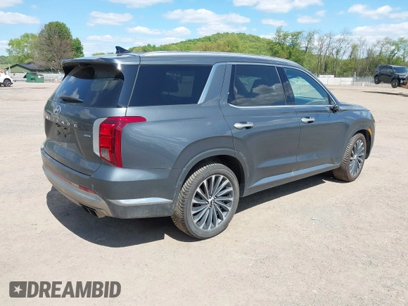 2023 Hyundai Palisade Calligraphy z VIN KM8R7DGE5PU499257, wystawiony jako IAAI lot #42231889 z przebiegiem 90 714 mil mil oraz . Historia ofert i sprzedaży dostępna na DreamBid. Obrazek 4.