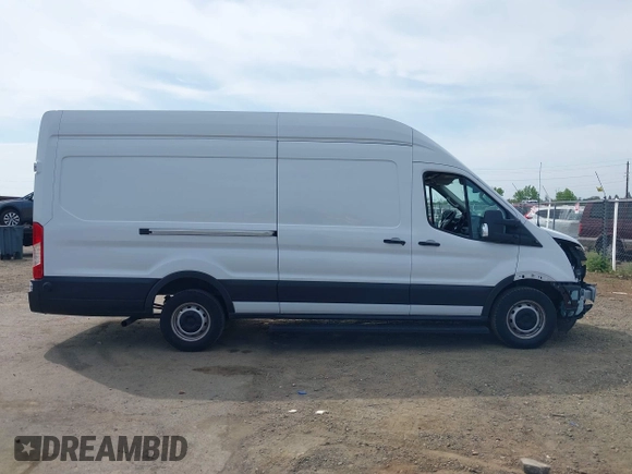 2022 Ford Transit Cargo with VIN 1FTBW3XG9NKA84214, listed as a IAAI auction lot 42033413 with 6,746 mi miles and . Bid and sale history available at DreamBid. Image 14.