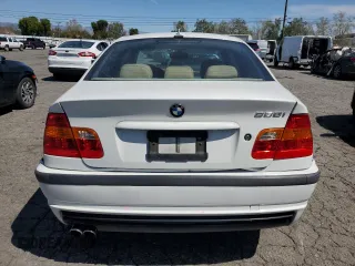 2005 BMW 3 Series 330i with VIN WBAEV53455KM41084, listed as a Copart auction lot 50338425 with 223,116 mi miles and Salvage title. Bid and sale history available at DreamBid. Image 6.