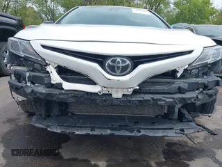 2020 Toyota Camry SE z VIN 4T1G11AKXLU908241, wystawiony jako IAAI lot #42093849 z przebiegiem 132 855 mil mil oraz . Historia ofert i sprzedaży dostępna na DreamBid. Obrazek 6.