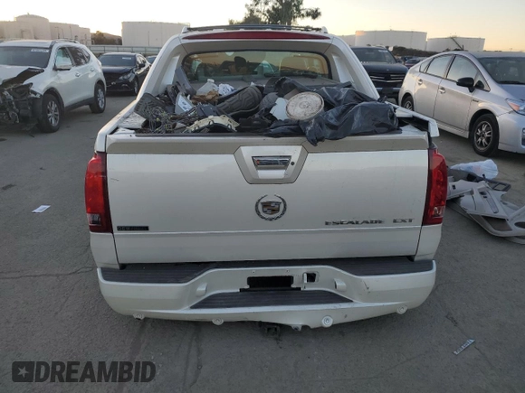 2004 Cadillac Escalade EXT z VIN 3GYEK62N94G256810, wystawiony jako Copart lot #85347844 z przebiegiem Nie podano mil oraz Szkoda całkowita • Salvage title. Historia ofert i sprzedaży dostępna na DreamBid. Obrazek 6.