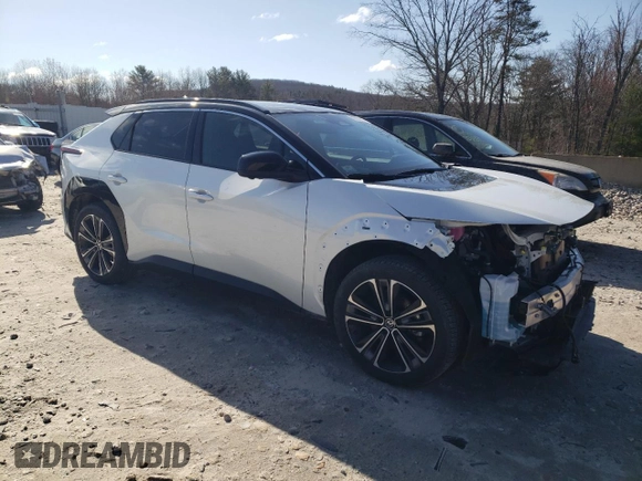 2023 Toyota bZ4X XLE with VIN JTMABACA9PA041997, listed as a Copart auction lot 52922215 with 6,490 mi miles and Salvage Title. Bid and sale history available at DreamBid. Image 4.