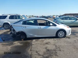 2021 Toyota Prius L Eco with VIN JTDKAMFU7M3142616, listed as a IAAI auction lot 42755833 with 40,542 mi miles and . Bid and sale history available at DreamBid. Image 14.