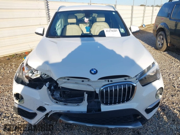 2018 BMW X1 sDrive28i with VIN WBXHU7C36J5H41267, listed as a IAAI auction lot 41270207 with 84,726 mi miles. Bid and sale history available at carsss.com. Image 12.